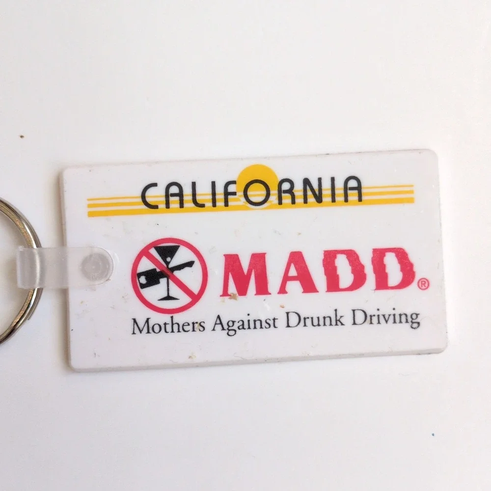 Vintage 90s Y2K MADD Keychain White California Mothers Against Drunk Driving